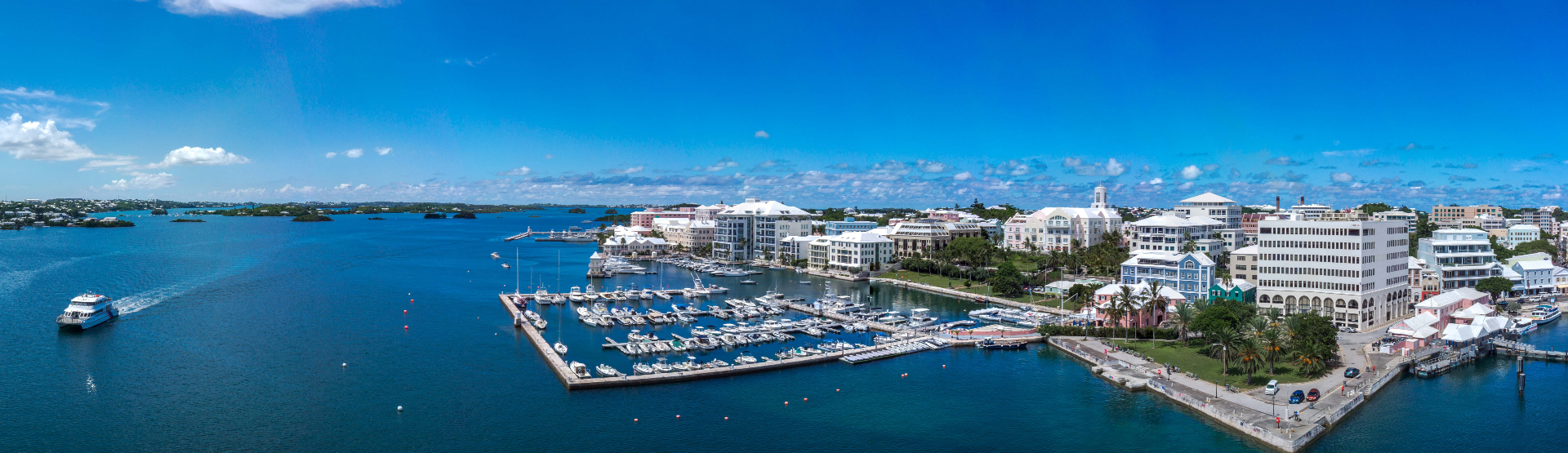 Aerial view of Bermuda harbor with marina, boats and waterfront buildings